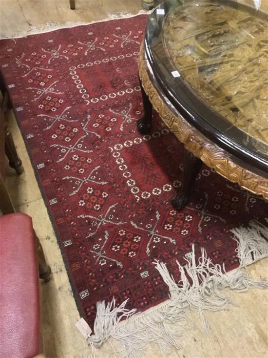 Red ground Bokhara rug